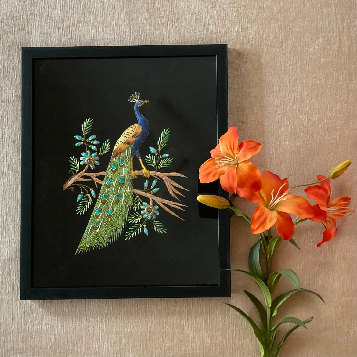 Sure! Heres an optimized title for the e-commerce product:

Exquisite Handcrafted Zardozi-Embroidered Peacock Painting - Luxurious Handpainted Wall Décor for Elegant Home Accents